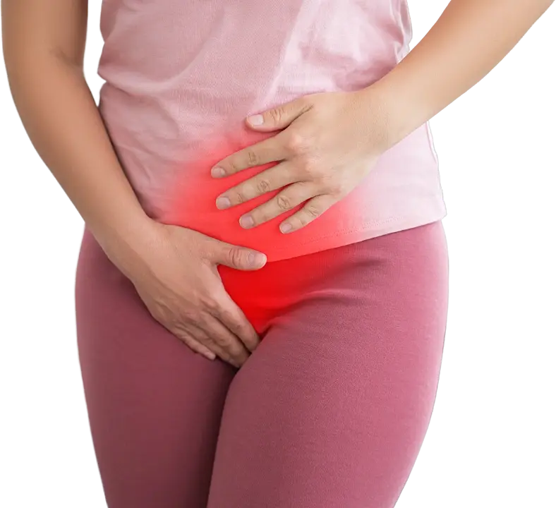 A woman holding her lower abdomen, the sore area picked out in red